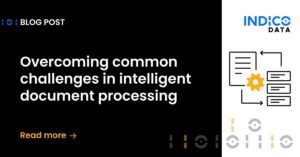 Blog post title: "Overcoming common challenges in intelligent document processing." Right side features Indico Data logo and an icon of documents with a gear. Text at bottom reads "Read more.